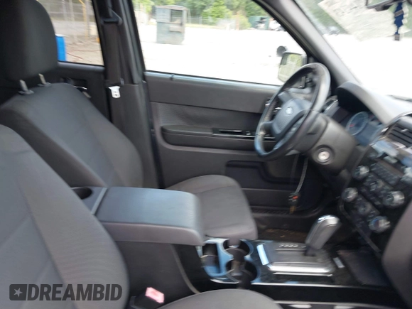 2011 Ford Escape XLT with VIN 1FMCU0D74BKA42232, listed as a IAAI auction lot 42144143 with 231,025 mi miles. Bid and sale history available at carsss.com. Image 5.