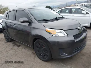 2010 Scion xD with VIN JTKKU4B42AJ057390, listed as a IAAI auction lot 41775058 with 210,287 mi miles. Bid and sale history available at carsss.com. Image 1.