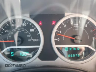 2009 Jeep Wrangler Sahara with VIN 1J4FA54119L747068, listed as a Copart auction lot 71209904 with 86,978 mi miles and Salvage title. Bid and sale history available at DreamBid. Image 9.