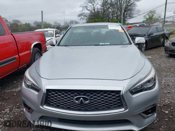 2018 Infiniti Q50 Luxe with VIN JN1EV7AP8JM361307, listed as a IAAI auction lot 41857098 with 98,243 mi miles and . Bid and sale history available at DreamBid. Image 12.