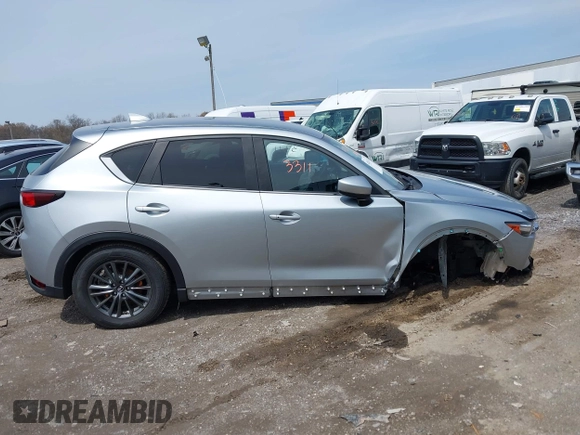 2020 Mazda CX-5 Touring with VIN JM3KFACM9L0785464, listed as a IAAI auction lot 42023311 with 90,062 mi miles and . Bid and sale history available at DreamBid. Image 13.