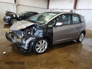 2010 Honda Fit Sport with VIN JHMGE8G48AS023215, listed as a Copart auction lot 64027615 with 134,525 mi miles and Salvage title. Bid and sale history available at DreamBid. Image 1.