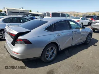 2023 Honda Accord EX-L with VIN 1HGCY2F65PA060147, listed as a Copart auction lot 57876835 with 10,995 mi miles and Salvage title. Bid and sale history available at DreamBid. Image 3.