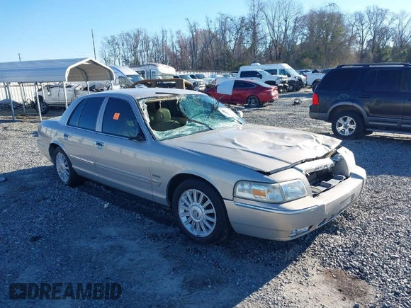 2010 Mercury Grand Marquis LS z VIN 2MEBM7FV2AX635506, wystawiony jako IAAI lot #41597727 z przebiegiem Nie podano mil oraz . Historia ofert i sprzedaży dostępna na DreamBid. Obrazek 1.