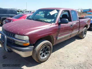 1999 Chevrolet Silverado 1500 LT with VIN 2GCEK19T9X1145877, listed as a IAAI auction lot 41985023 with 241,622 mi miles. Bid and sale history available at carsss.com. Image 2.