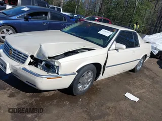 2000 Cadillac Eldorado ESC with VIN 1G6EL12Y0YB702778, listed as a IAAI auction lot 41988107 with 203,526 mi miles. Bid and sale history available at carsss.com. Image 17.