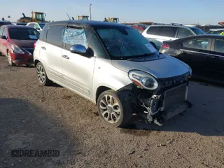 2015 FIAT 500L Lounge with VIN ZFBCFACH8FZ031149, listed as a IAAI auction lot 41780747 with 131,054 mi miles. Bid and sale history available at carsss.com. Image 1.