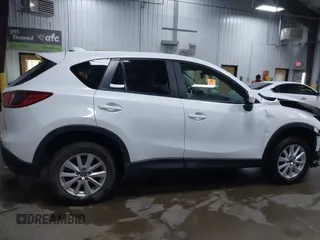 2014 Mazda CX-5 Touring with VIN JM3KE4CY4E0349034, listed as a IAAI auction lot 41478954 with 117,502 mi miles. Bid and sale history available at carsss.com. Image 13.