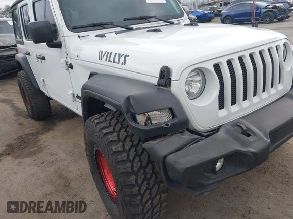 2023 Jeep Wrangler Sport S with VIN 1C4HJXDG0PW638871, listed as a IAAI auction lot 42129295 with 16,171 mi miles and . Bid and sale history available at DreamBid. Image 6.