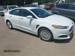 2013 Ford Fusion SE Hybrid z VIN 3FA6P0LU3DR328786, wystawiony jako IAAI lot #42604212 z przebiegiem 132 423 mil mil oraz . Historia ofert i sprzedaży dostępna na DreamBid. Obrazek 1.