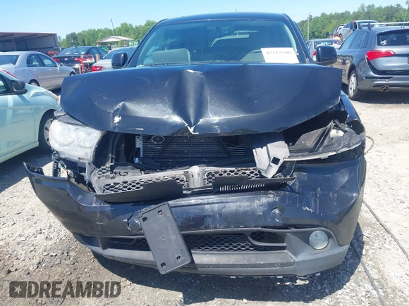 2013 Dodge Durango SXT with VIN 1C4RDJAG8DC617759, listed as a IAAI auction lot 42113300 with 185,152 mi miles and . Bid and sale history available at DreamBid. Image 12.
