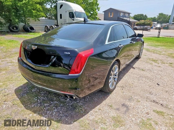 2016 Cadillac CT6 Luxury AWD with VIN 1G6KD5RS2GU160692, listed as a Copart auction lot 65585795 with 116,204 mi miles and Clean title. Bid and sale history available at DreamBid. Image 4.