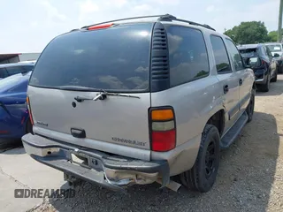 2004 Chevrolet Tahoe LS z VIN 1GNEC13T44R180732, wystawiony jako IAAI lot #42170904 z przebiegiem Nie podano mil oraz . Historia ofert i sprzedaży dostępna na DreamBid. Obrazek 4.
