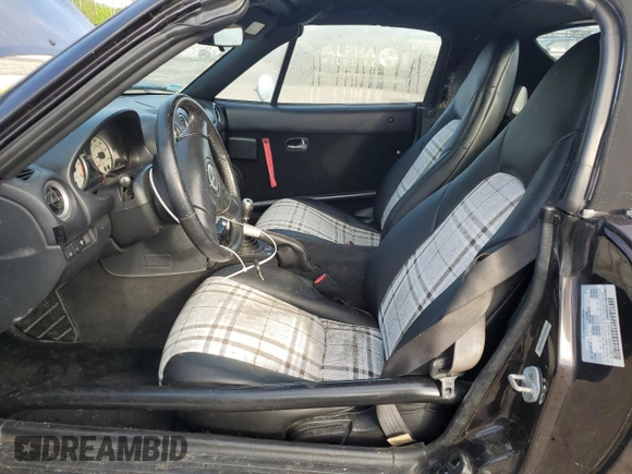 2004 Mazda MX-5 Miata LS with VIN JM1NB353140408906, listed as a Copart auction lot 56664715 with 86,603 mi miles and Salvage title. Bid and sale history available at DreamBid. Image 7.