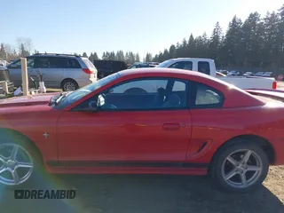 1996 Ford Mustang with VIN 1FALP4042TF180575, listed as a IAAI auction lot 41561882 with 248,183 mi miles. Bid and sale history available at carsss.com. Image 14.