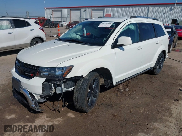 2018 Dodge Journey Crossroad z VIN 3C4PDDGG0JT386534, wystawiony jako IAAI lot #41958650 z przebiegiem 128 938 mil mil oraz . Historia ofert i sprzedaży dostępna na DreamBid. Obrazek 2.