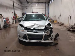 2012 Ford Focus SE with VIN 1FAHP3F21CL284921, listed as a IAAI auction lot 42054351 with 164,377 mi miles and . Bid and sale history available at carsss.com. Image 12.