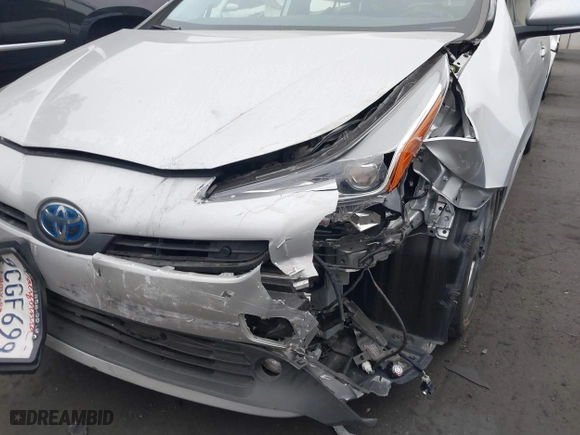 2022 Toyota Prius L Eco with VIN JTDKAMFU0N3181467, listed as a IAAI auction lot 41802679 with 121,749 mi miles. Bid and sale history available at carsss.com. Image 6.