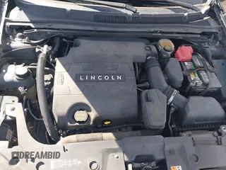 2014 Lincoln MKS with VIN 1LNHL9DK1EG604323, listed as a IAAI auction lot 41635817 with 223,136 mi miles. Bid and sale history available at carsss.com. Image 10.
