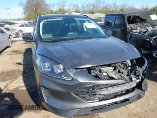 2021 Ford Escape SE Hybrid z VIN 1FMCU0BZ5MUB14938, wystawiony jako IAAI lot #41442583 z przebiegiem 62 265 mil mil oraz . Historia ofert i sprzedaży dostępna na DreamBid. Obrazek 1.