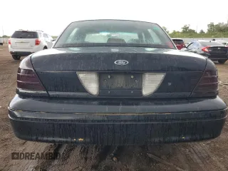 2004 Ford Police Interceptor with VIN 2FAHP71W14X138220, listed as a Copart auction lot 59930385 with 169,302 mi miles and Salvage title. Bid and sale history available at DreamBid. Image 6.