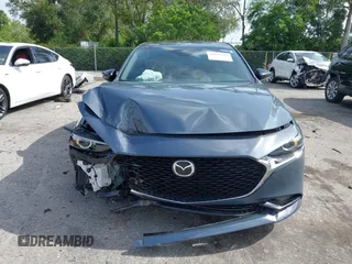 2024 Mazda 3 S Carbon Edition with VIN 3MZBPBCM2RM403824, listed as a IAAI auction lot 42612315 with 8,261 mi miles and . Bid and sale history available at DreamBid. Image 13.