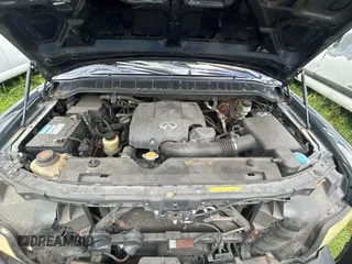 2007 Infiniti QX56 z VIN 5N3AA08A47N804400, wystawiony jako Copart lot #59031335 z przebiegiem 202 776 mil mil oraz Tytuł czysty. Historia ofert i sprzedaży dostępna na DreamBid. Obrazek 7.