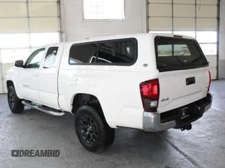 2021 Toyota Tacoma SR z VIN 3TYSZ5AN0MT009231, wystawiony jako Copart lot #59748295 z przebiegiem 37 912 mil mil oraz Szkoda całkowita • Salvage title. Historia ofert i sprzedaży dostępna na DreamBid. Obrazek 4.