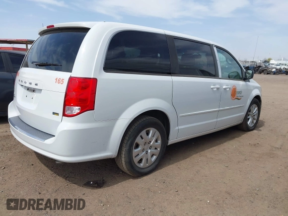 2017 Dodge Grand Caravan SE z VIN 2C4RDGBG4HR666987, wystawiony jako IAAI lot #41946734 z przebiegiem 239 683 mil mil oraz . Historia ofert i sprzedaży dostępna na DreamBid. Obrazek 4.