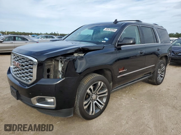 2018 GMC Yukon Denali with VIN 1GKS1CKJ8JR201028, listed as a Copart auction lot 83478394 with 133,302 mi miles and Salvage Title. Bid and sale history available at carsss.com. Image 1.