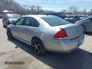 2013 Chevrolet Impala LTZ with VIN 2G1WC5E38D1235332, listed as a IAAI auction lot 41891472 with 137,567 mi miles and . Bid and sale history available at DreamBid. Image 3.