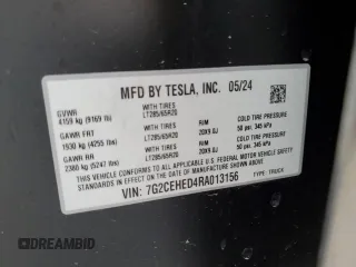 2024 Tesla Cybertruck z VIN 7G2CEHED4RA013156, wystawiony jako Copart lot #77332004 z przebiegiem 1 808 mil mil oraz Nie do naprawy • Non repairable. Historia ofert i sprzedaży dostępna na DreamBid. Obrazek 13.