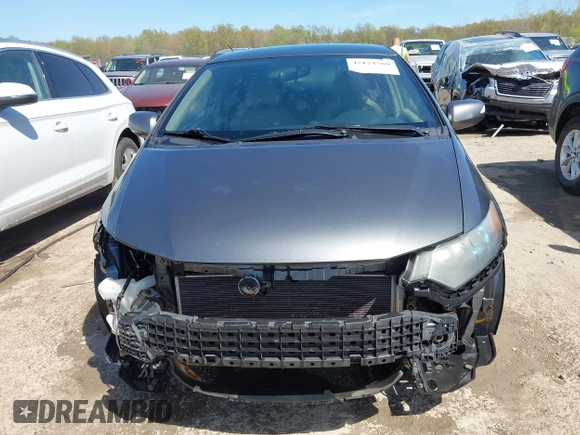 2010 Honda Insight EX with VIN JHMZE2H75AS008489, listed as a IAAI auction lot 42124780 with 226,100 mi miles and . Bid and sale history available at DreamBid. Image 13.