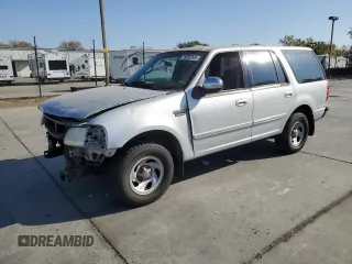 1997 Ford Expedition XLT z VIN 1FMEU1768VLA49281, wystawiony jako Copart lot #79895244 z przebiegiem 73 188 mil mil oraz Szkoda całkowita • Salvage title. Historia ofert i sprzedaży dostępna na DreamBid. Obrazek 1.