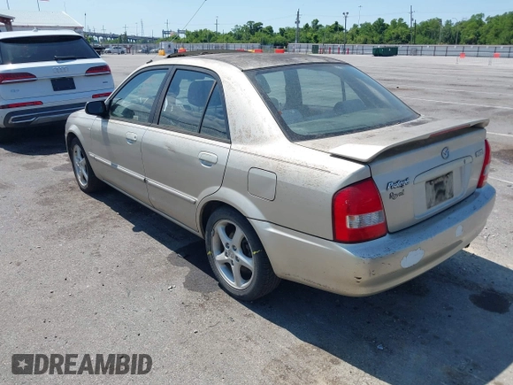 2002 Mazda Protege DX with VIN JM1BJ225820568350, listed as a IAAI auction lot 42188364 with 52,572 mi miles and . Bid and sale history available at DreamBid. Image 3.