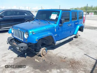 2016 Jeep Wrangler Unlimited Sahara with VIN 1C4HJWEG0GL154418, listed as a IAAI auction lot 41892333 with 102,410 mi miles and . Bid and sale history available at DreamBid. Image 2.