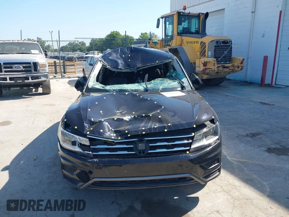 2020 Volkswagen Tiguan SE z VIN 3VV3B7AX7LM035567, wystawiony jako IAAI lot #42316223 z przebiegiem 64 730 mil mil oraz . Historia ofert i sprzedaży dostępna na DreamBid. Obrazek 6.