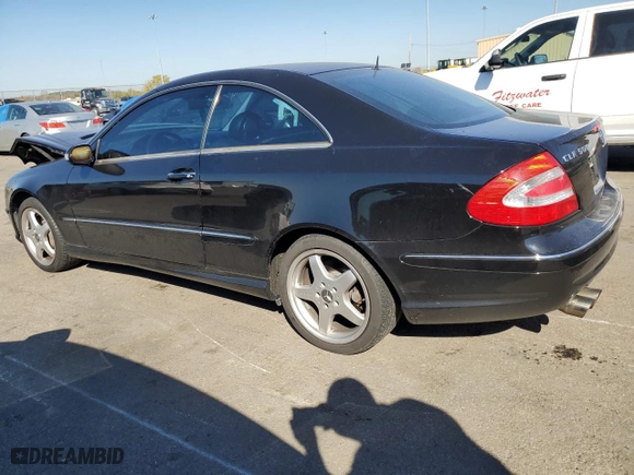 2003 Mercedes-Benz CLK-Class 5.0L with VIN WDBTJ75JX3F039229, listed as a Copart auction lot 77006714 with 111,617 mi miles and Salvage Title. Bid and sale history available at carsss.com. Image 2.