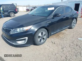 2012 Kia Optima Hybrid with VIN KNAGM4ADXC5018456, listed as a IAAI auction lot 42030994 with 1 mi miles. Bid and sale history available at carsss.com. Image 2.
