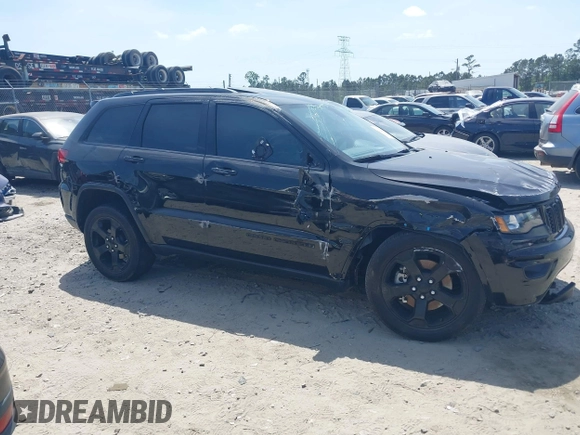 2021 Jeep Grand Cherokee Laredo E z VIN 1C4RJEAG9MC740244, wystawiony jako IAAI lot #42112847 z przebiegiem 32 897 mil mil oraz . Historia ofert i sprzedaży dostępna na DreamBid. Obrazek 13.