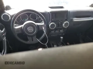 2014 Jeep Wrangler Unlimited Rubicon X с VIN 1C4HJWFG0EL142071, выставлен на аукционе Copart как лот 72898994 с пробегом 110 597 миль миль и Списание • Salvage title. История ставок и продаж доступна на DreamBid. Изображение 8.