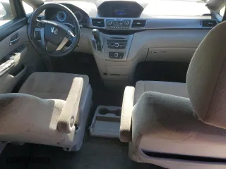 2015 Honda Odyssey LX with VIN 5FNRL5H29FB117569, listed as a Copart auction lot 87870755 with 147,295 mi miles and Salvage Title. Bid and sale history available at carsss.com. Image 8.