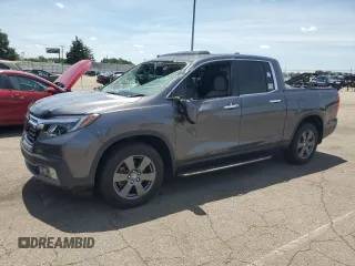 2020 Honda Ridgeline RTL-E with VIN 5FPYK3F73LB006438, listed as a Copart auction lot 62369155 with 26,657 mi miles and Salvage title. Bid and sale history available at DreamBid. Image 1.