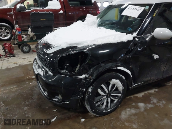 2014 MINI Countryman S with VIN WMWZC5C57EWP39161, listed as a IAAI auction lot 41342912 with 108,459 mi miles and . Bid and sale history available at DreamBid. Image 6.