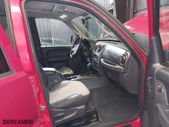 2004 Jeep Liberty Sport with VIN 1J4GL48K84W206909, listed as a IAAI auction lot 41465892 with 144,721 mi miles. Bid and sale history available at carsss.com. Image 5.