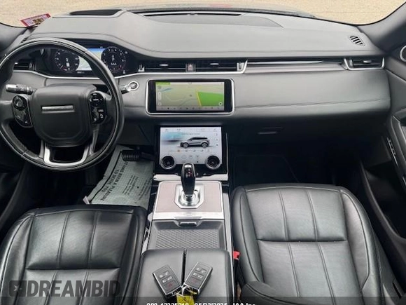 2020 Land Rover Range Rover Evoque SE z VIN SALZP2FX3LH001452, wystawiony jako IAAI lot #42335210 z przebiegiem 99 827 mil mil oraz . Historia ofert i sprzedaży dostępna na DreamBid. Obrazek 10.