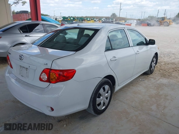 2010 Toyota Corolla with VIN 1NXBU4EE0AZ335239, listed as a IAAI auction lot 42155710 with 215,134 mi miles. Bid and sale history available at carsss.com. Image 4.