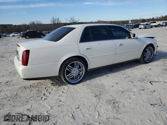 2001 Cadillac DeVille z VIN 1G6KD54Y61U227040, wystawiony jako Copart lot #46423295 z przebiegiem 180 289 mil mil oraz Szkoda całkowita • Salvage title. Historia ofert i sprzedaży dostępna na DreamBid. Obrazek 3.