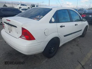 2000 Ford Focus LX with VIN 1FAFP33P3YW254784, listed as a IAAI auction lot 41429406 with 88,572 mi miles and . Bid and sale history available at carsss.com. Image 4.