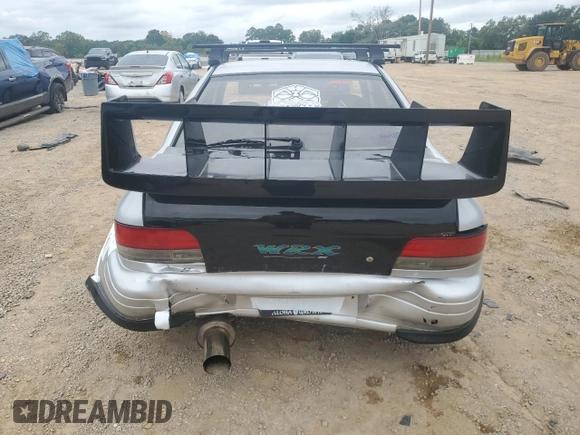 1995 Subaru Impreza with VIN GC8030988, listed as a Copart auction lot 70242354 with 123,696 mi miles and Salvage title. Bid and sale history available at DreamBid. Image 6.